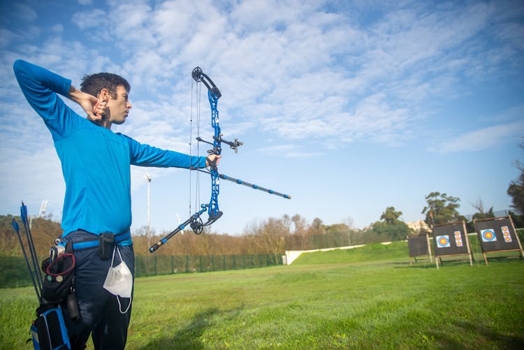 Archer Aiming On An Archery Target 
