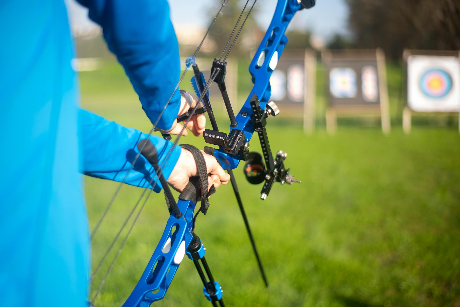 A Person Using a Compound Bow