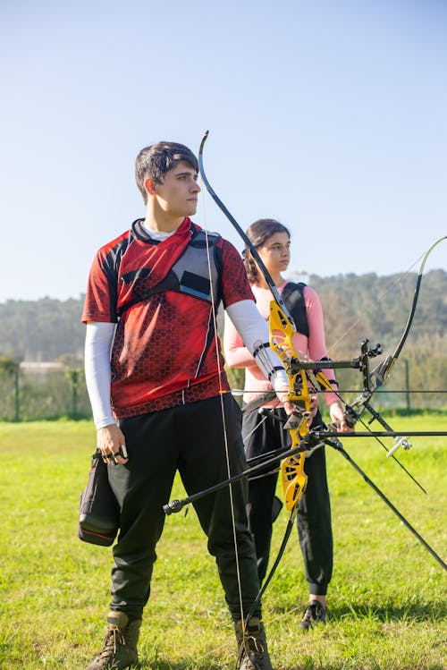 Archers holding Archery Bows