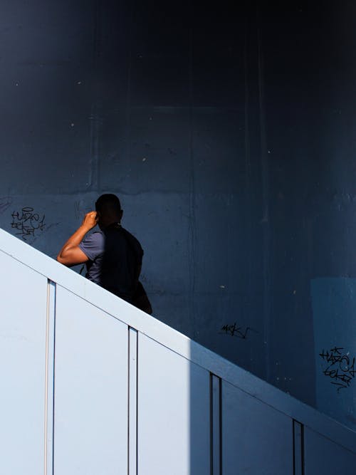 Silhouette of Person standing on Staircase