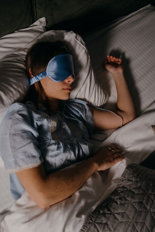 Free Asleep Woman wearing Eye Mask Stock Photo