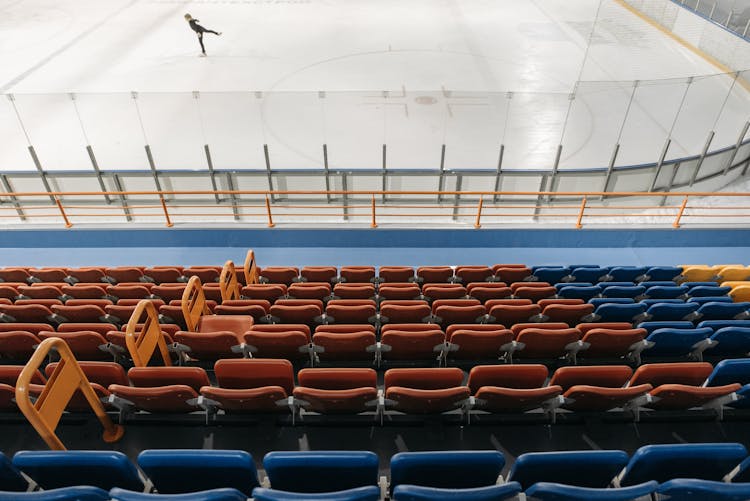 A Person Ice Skating On Ice Rink