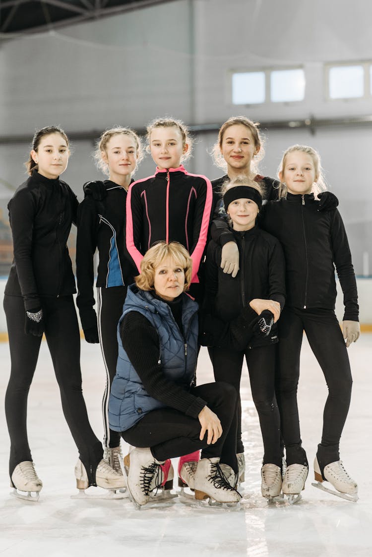 Group Of Figure Skaters Posing Together