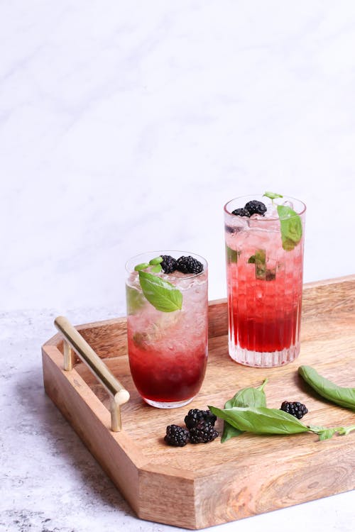Free Delicious beverage with blackberries on wooden tray Stock Photo