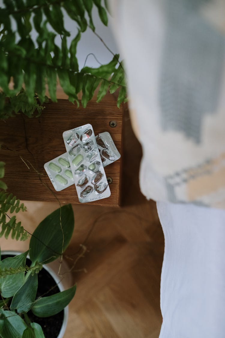 Medicine Tables On Wooden Table