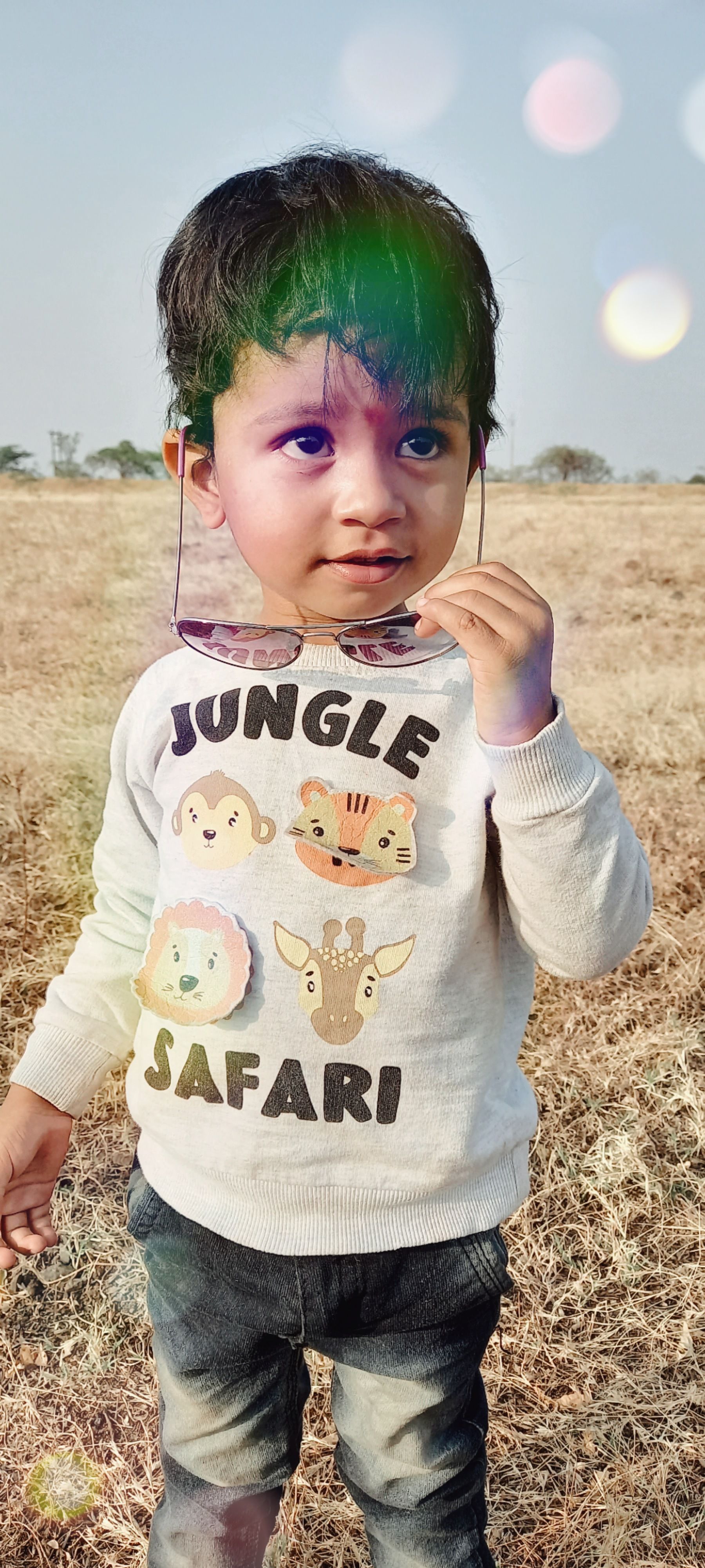 Person holding pomegranate seeds in their hands