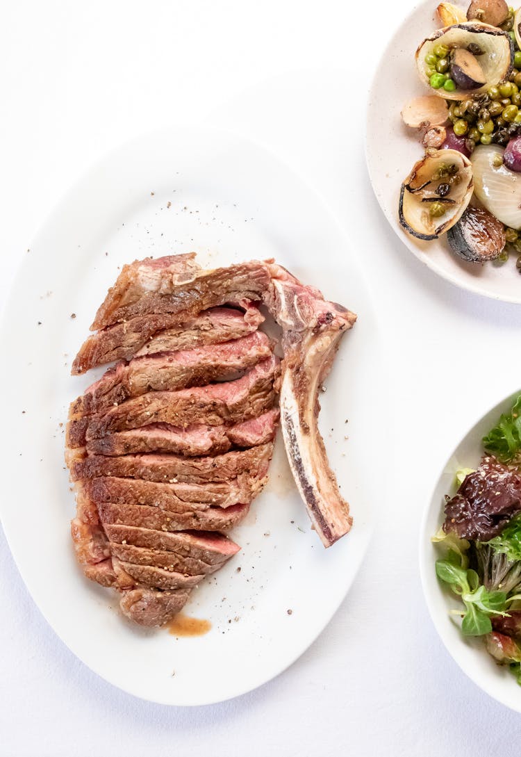 Tasty Ribeye Steak Served With Fresh Salad