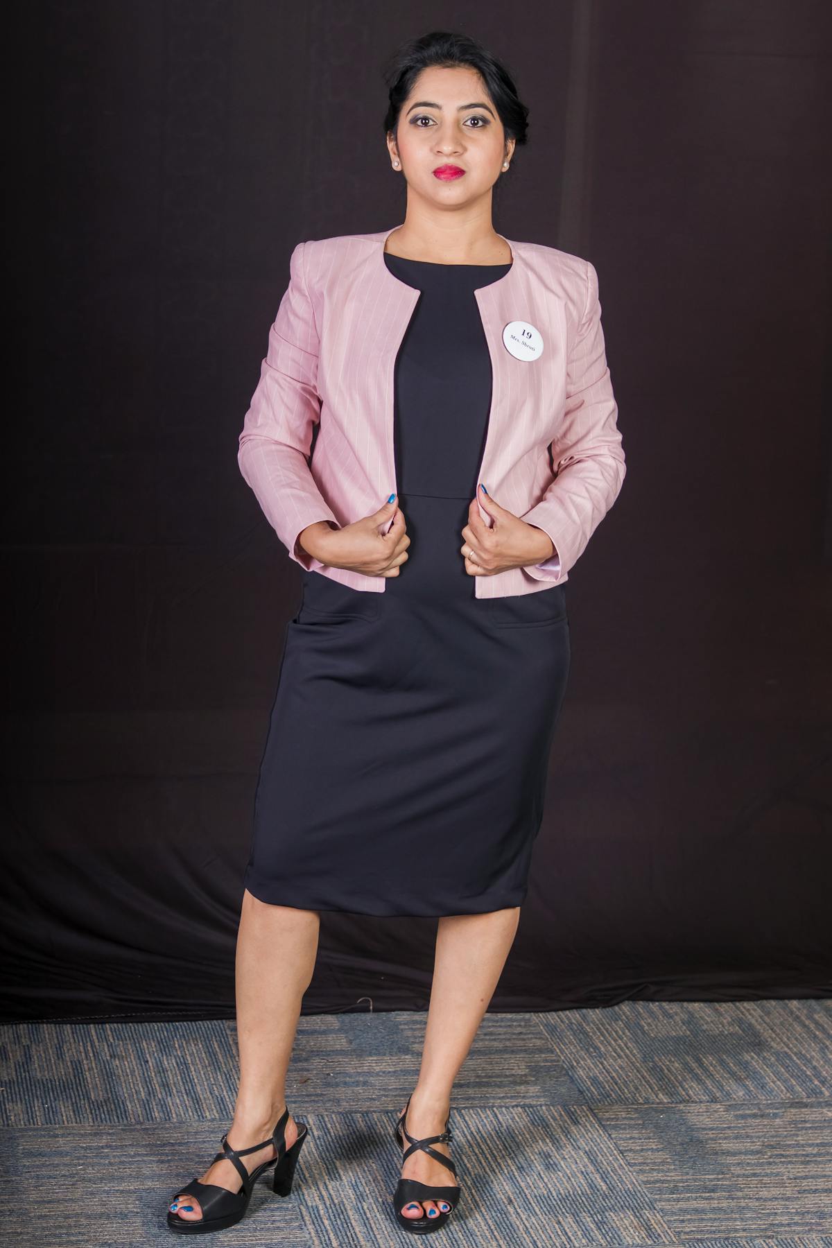 Person spooning creamy white cheese mixture into a small glass bowl