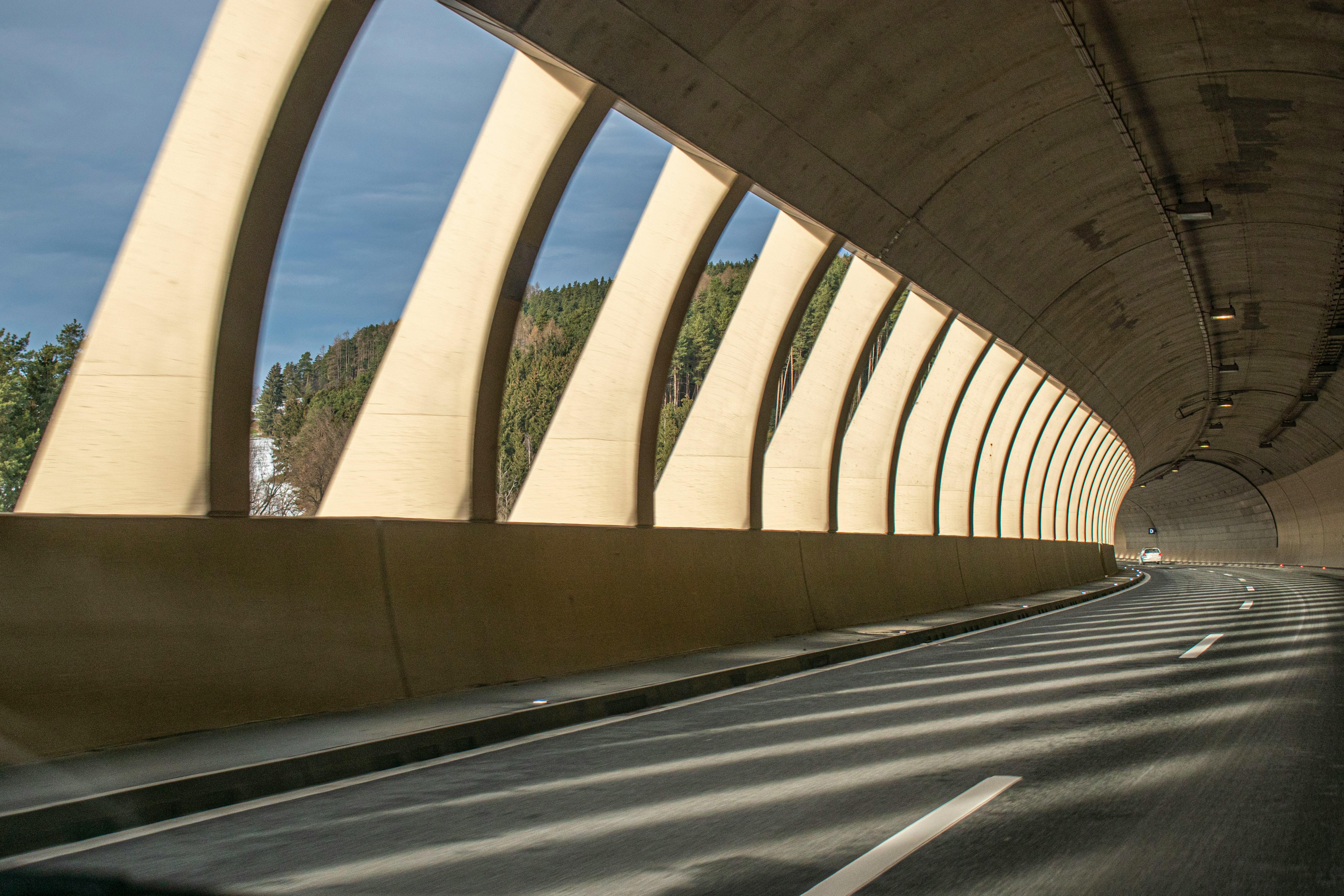 Cottage cheese toast topped with avocado and sliced radishes on a cutting board