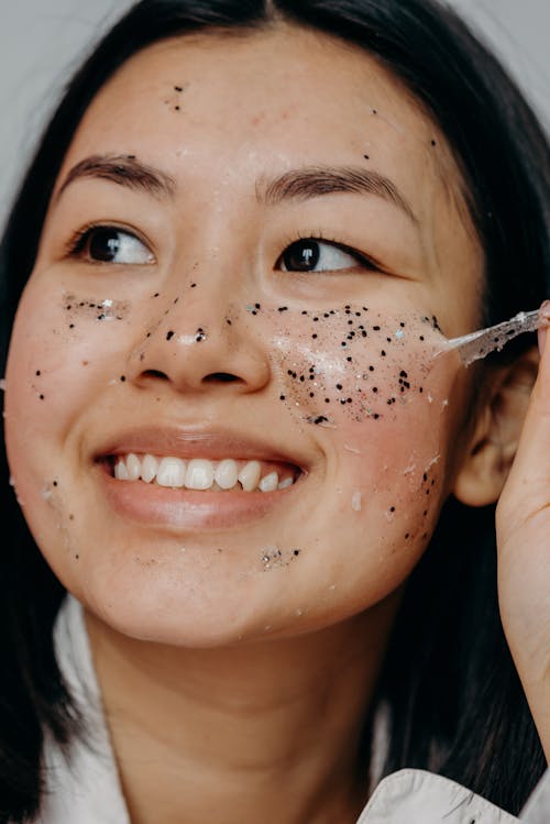Woman with Black and White Glitter on Face