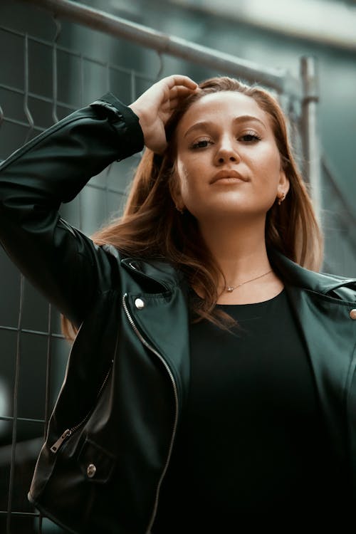 Free A Portrait of a Woman in a Black Leather Jacket Stock Photo
