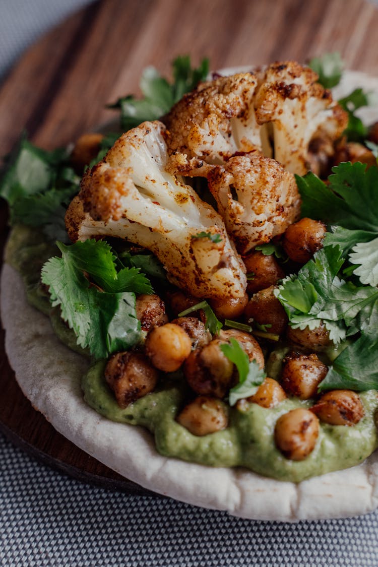 Close-up Of Roasted Cauliflower And Chickpeas Pita