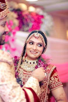 Beautiful Indian bride adorned in traditional attire at a vibrant wedding ceremony.