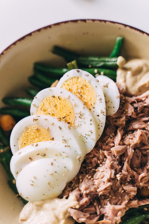 Free Hard Boiled Eggs with Tuna and Bean Salad in Bowl Stock Photo