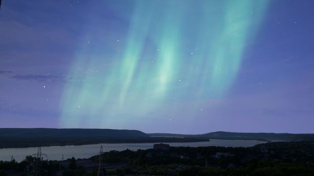 Vibrant aurora borealis gracing the night sky over Samara, Russia.