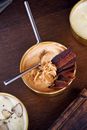 Stainless Steel Spoon on Brown Ceramic Bowl