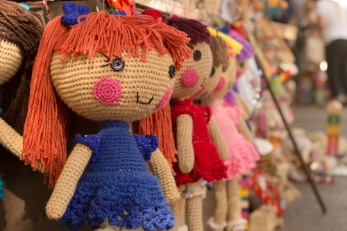 Free Brown Purple Red Knitted Doll Stock Photo