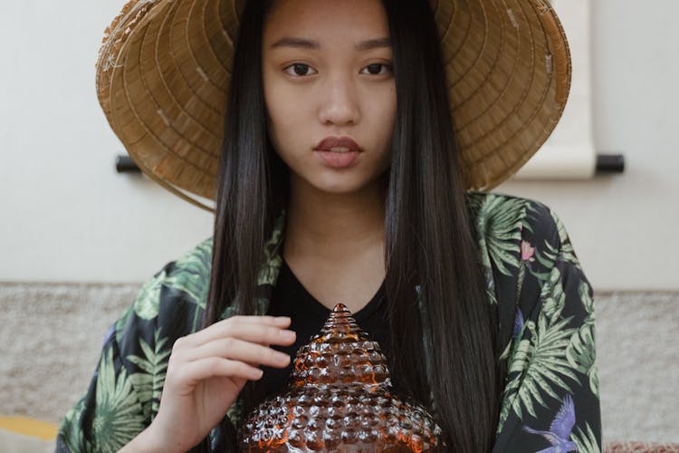 A Woman Wearing Conical Hat