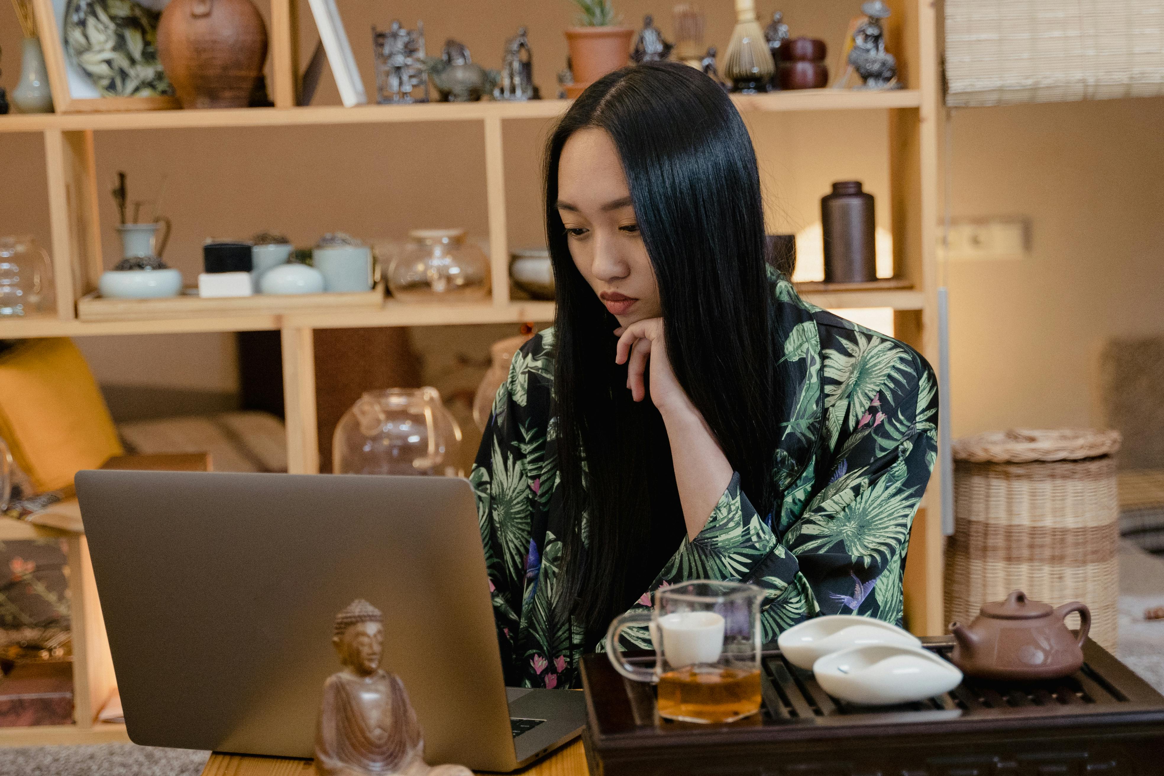 a woman using a laptop