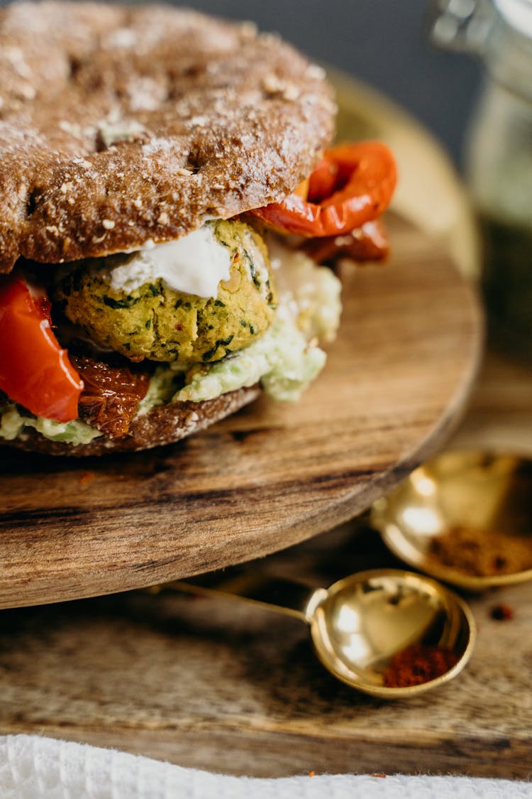 Vegan Falafel Burger On Wooden Plate