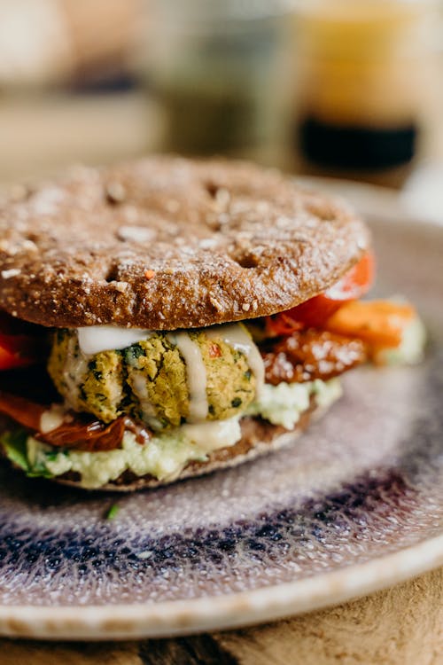 Free Vegan Falafel Burger on Plate Stock Photo