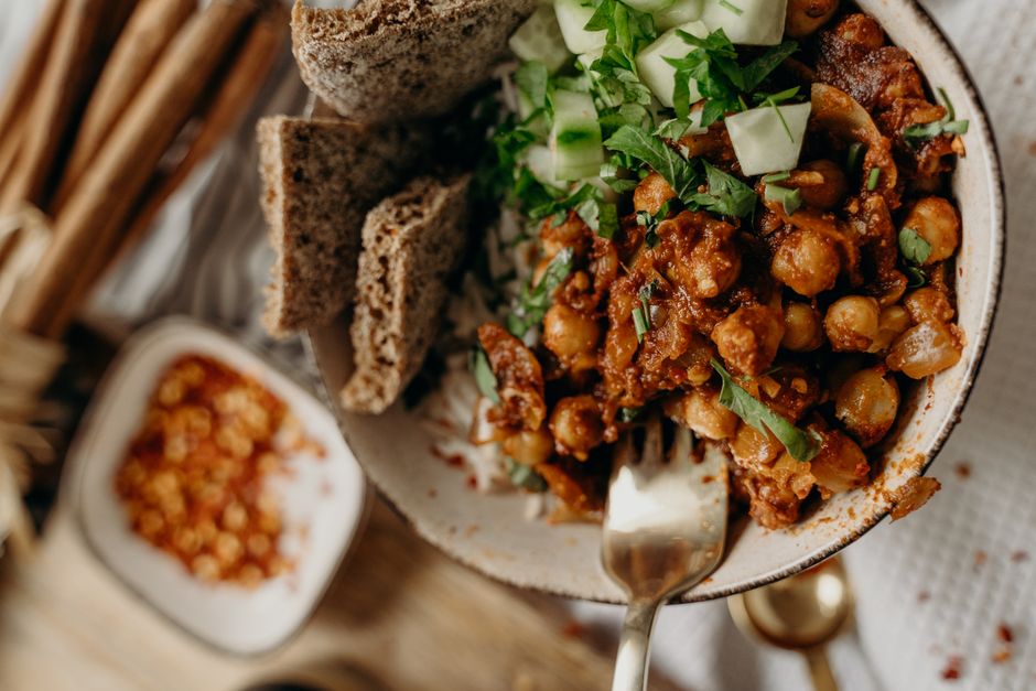 Photo by Alesia Kozik on Pexels Delicious vegan chickpea chili with fresh vegetables, perfect for a healthy meal. - Photo by Alesia Kozik on Pexels