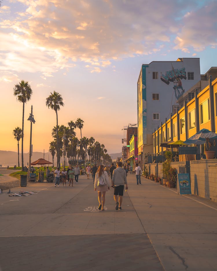 People Walking At The Ocean Front Walk In Venice