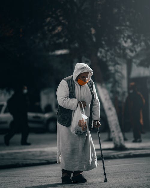 Elderly Man in White Traditional Clothes
