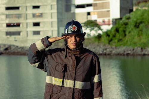 Free Fireman doing a Salute Gesture Stock Photo
