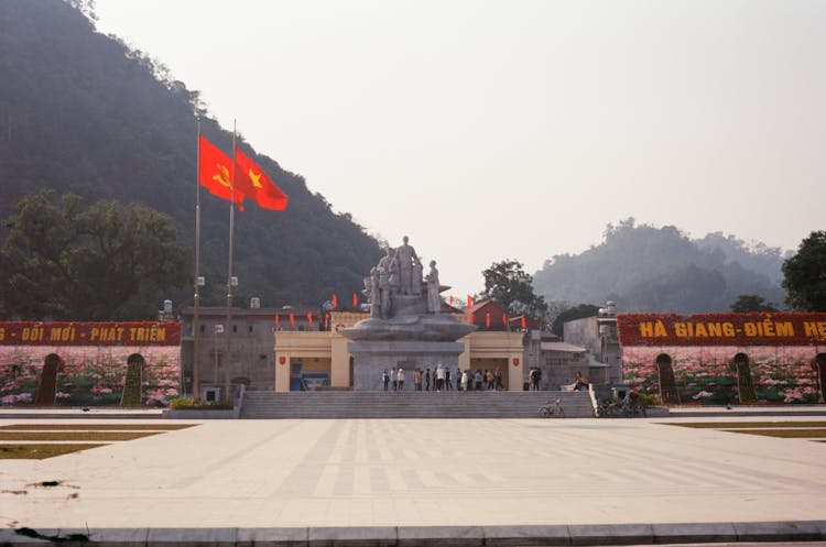 The Statue Of Uncle Ho And The People In Ha Giang