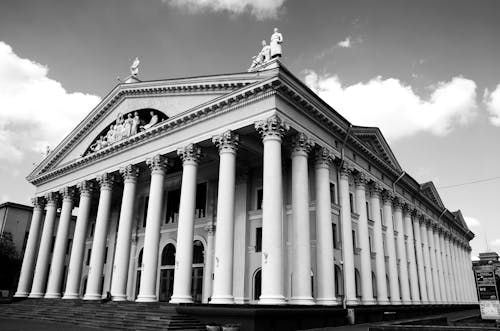 Grayscale Photo of Concrete Building