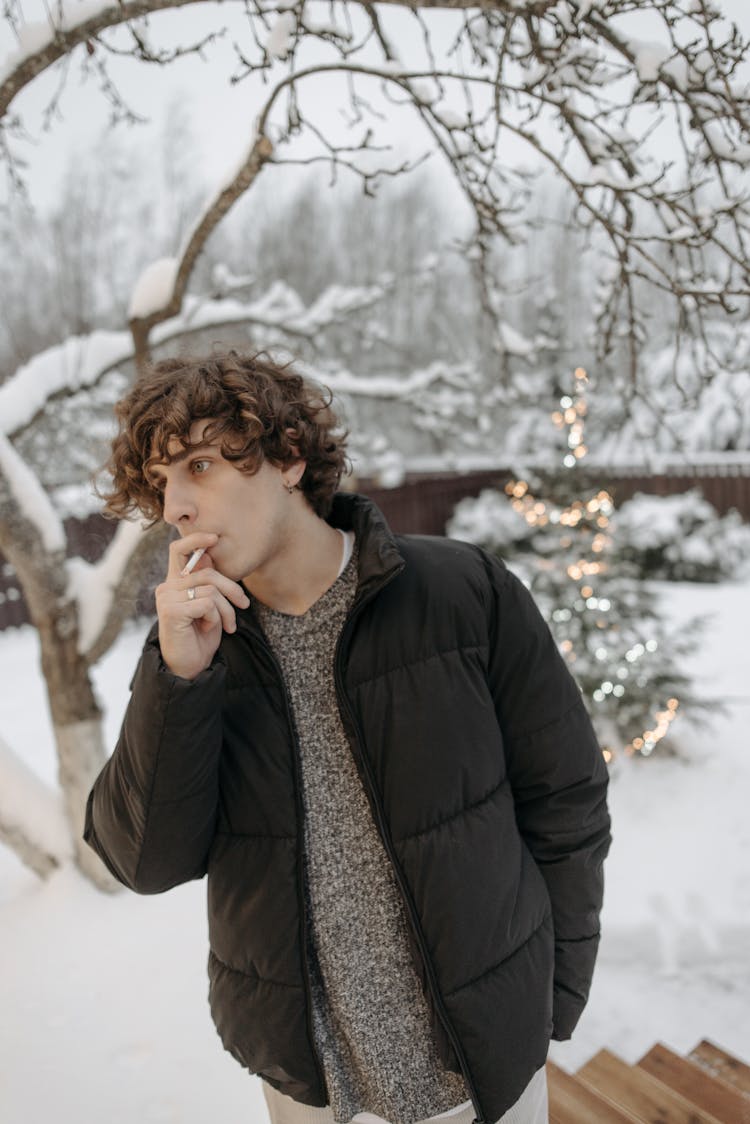 Man Wearing Black Puffer Jacket