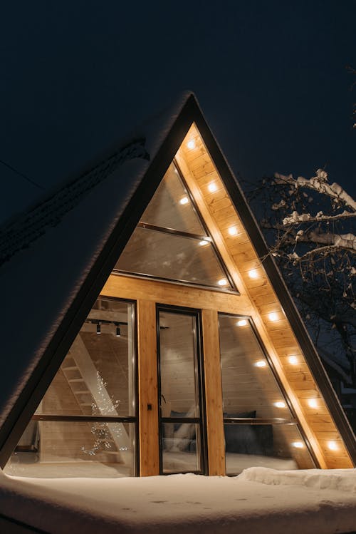 Triangular House with Thick Snow