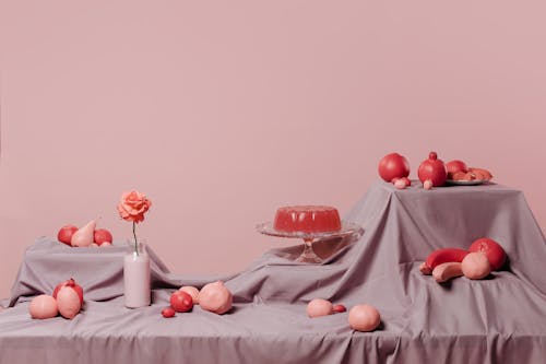 Fruit Decoration in Pink Colors and Rose in a Milk Bottle