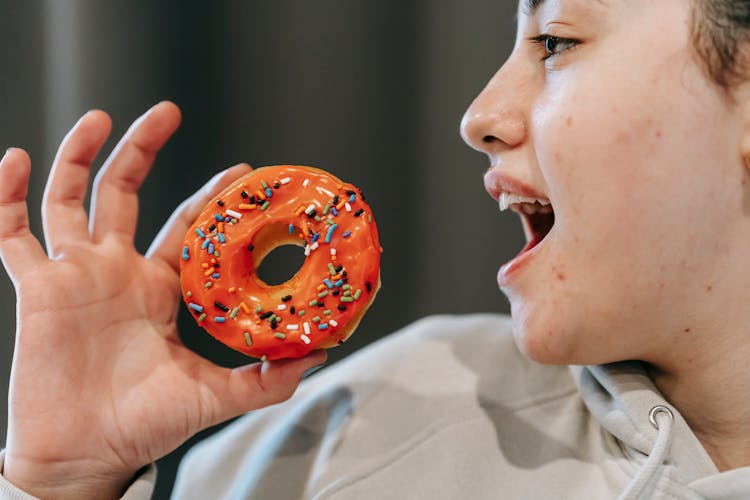 Crop Content Woman Biting Delicious Donut