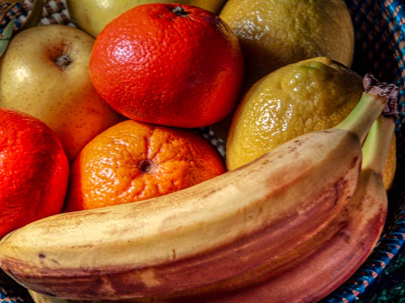 Woman measuring creatine powder supplement dosage