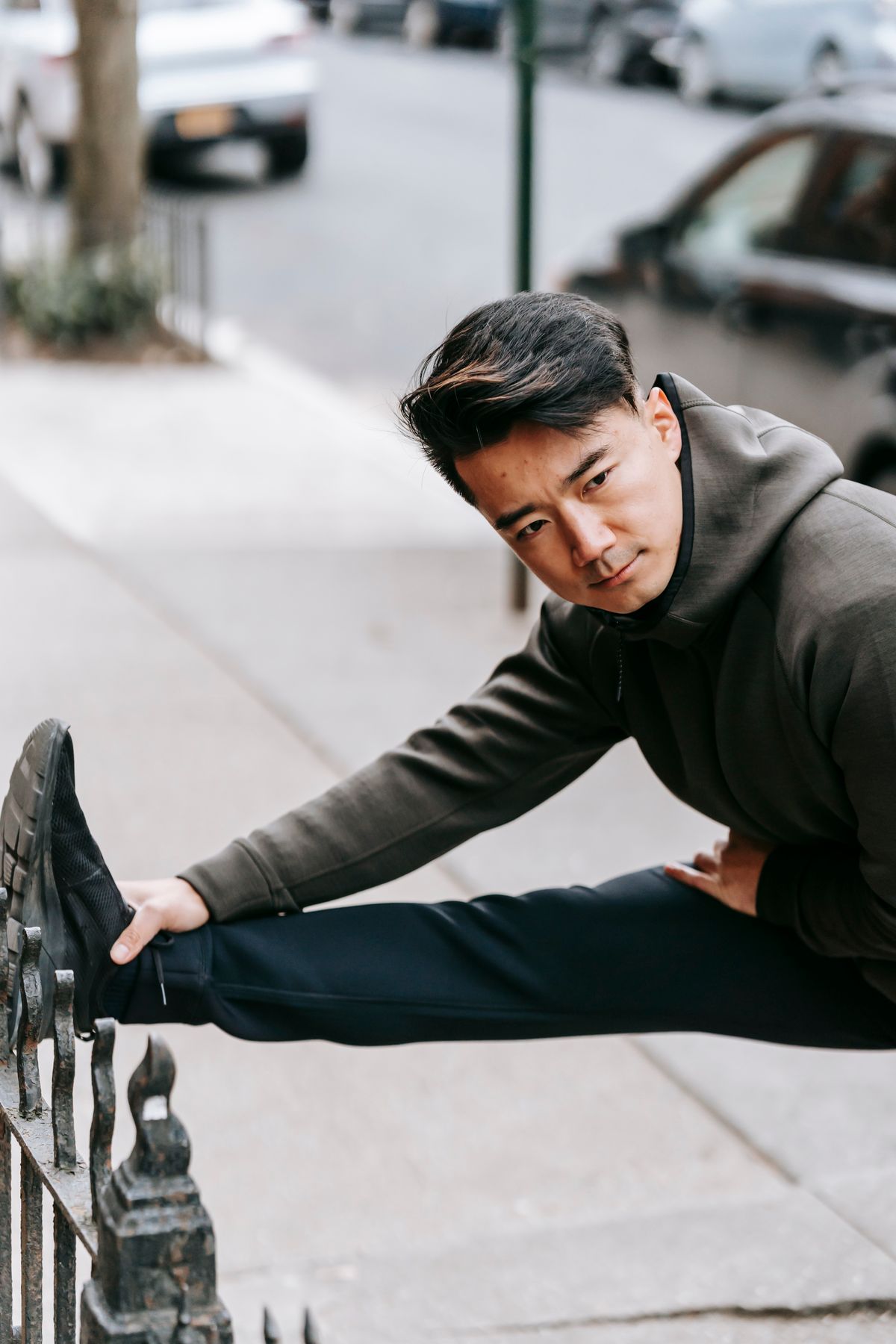 Person on scale with healthy food nearby