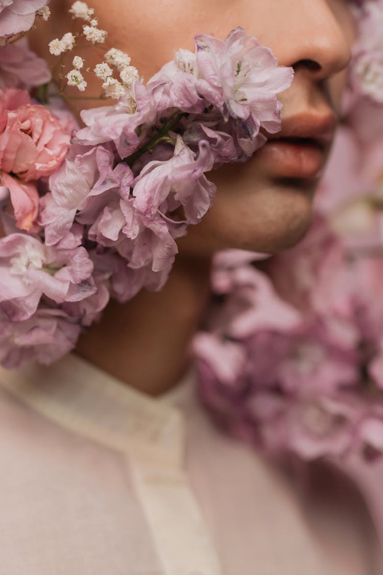 Portrait Of A Handsome Man With Purple And Pink Flowers