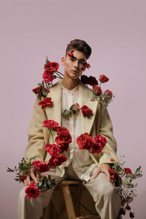 Man In Beige Suit With Red Roses