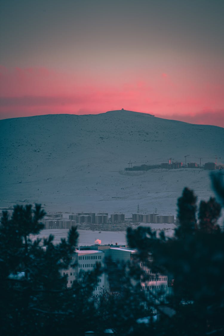 Hazy Sunset Over The Mountain