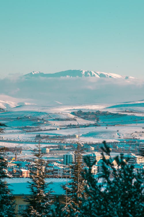 Gratis stockfoto met besneeuwde berg, blauwe lucht, decor