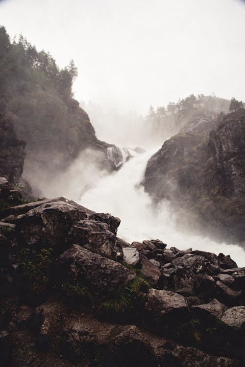 Free Scenic View of a Waterfall in the Forest Stock Photo