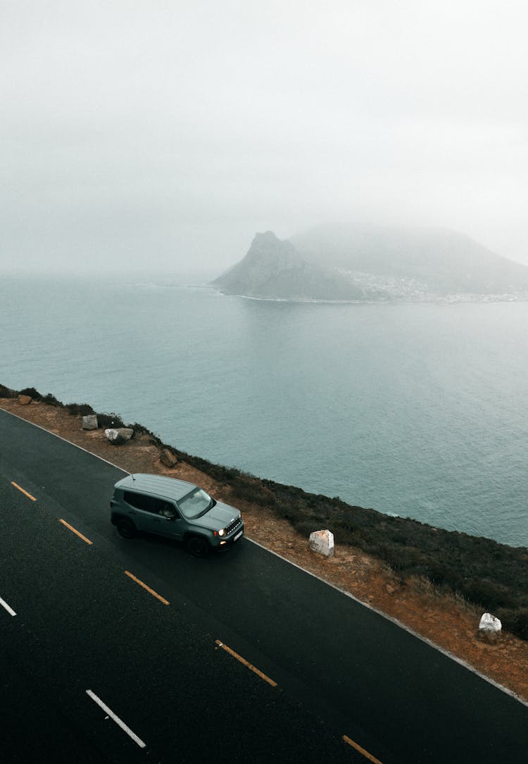 Aerial View Of An SUV Car On The Road