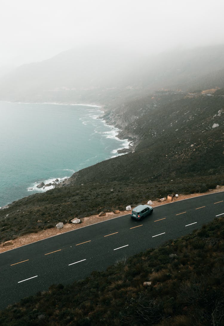 Drone Shot Of A Car On Road