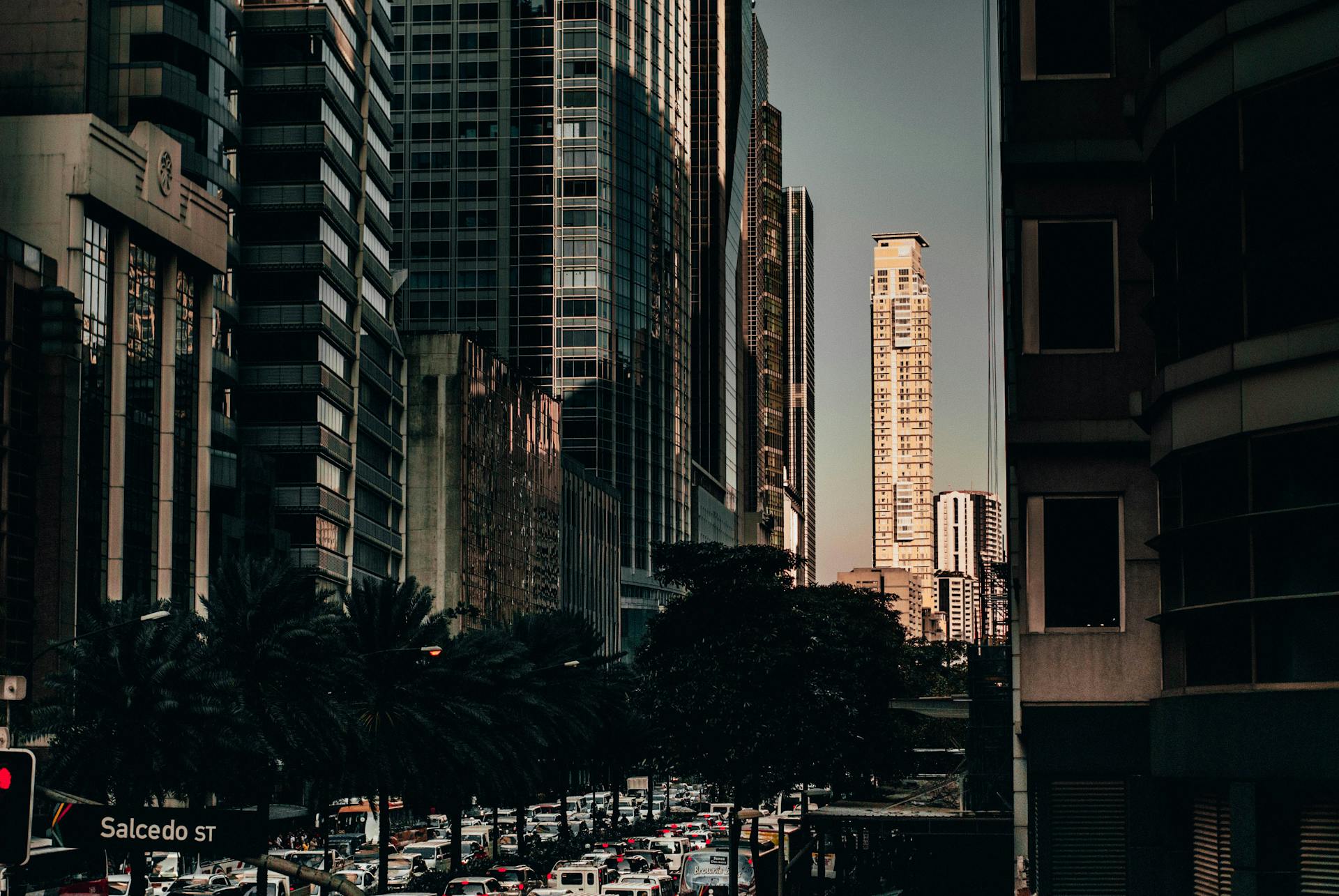 Explore the bustling Makati City skyline featuring high-rise buildings and vibrant urban life.