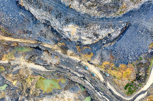 Excavators in Rocky Landscape