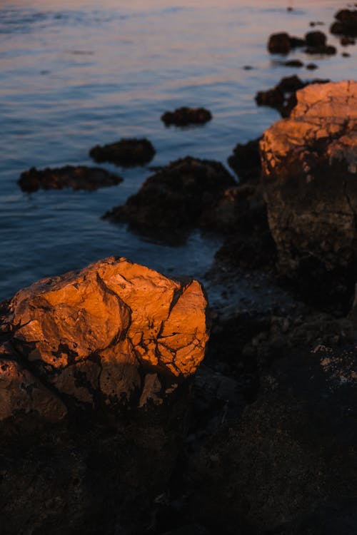 Brown Rock Formation beside the Lake