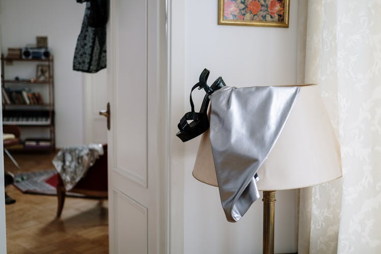 A Shoe And A Skirt On The Lampshade