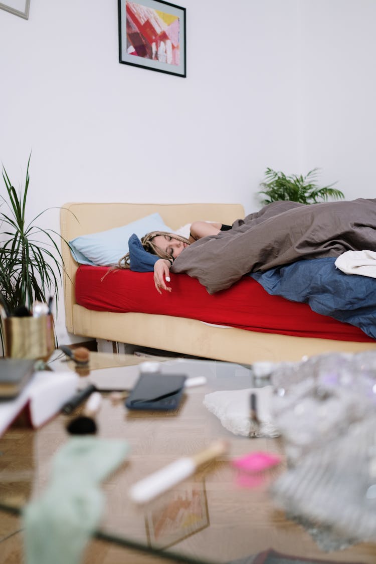 Woman Lying On The Bed