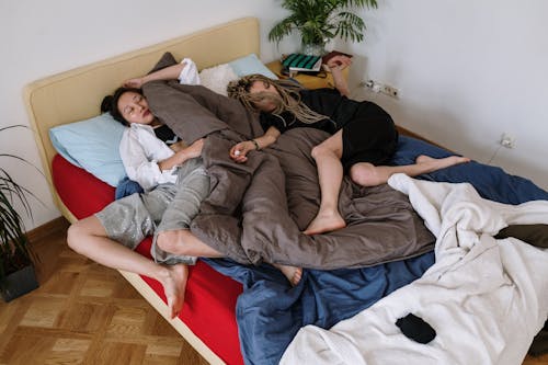 Women Sleeping in Bed
